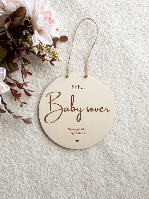 "Baby sover"-skilt